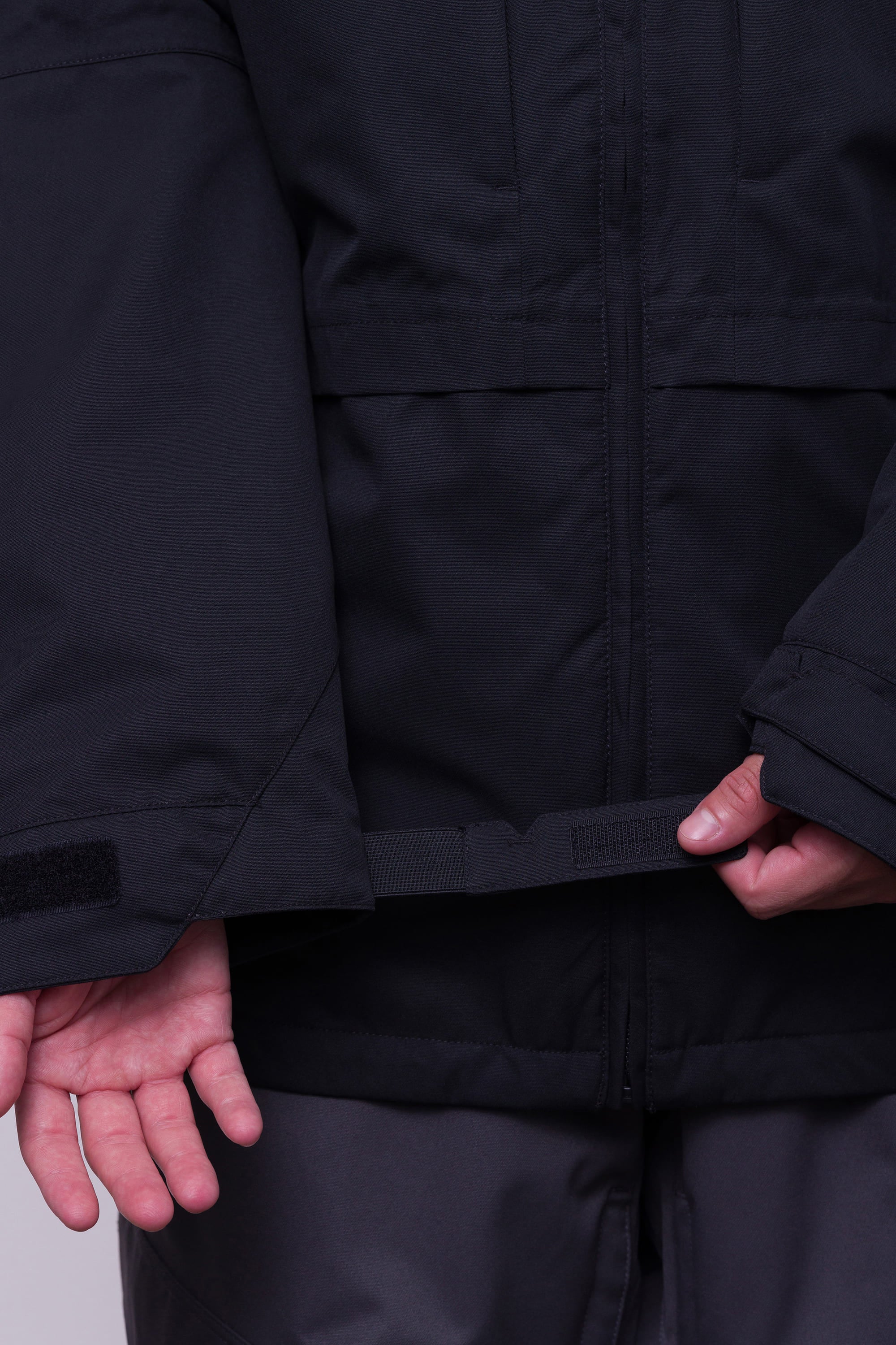 Smarty 3-IN-1 Form Jacket showcasing hem adjustment and waterproof material.