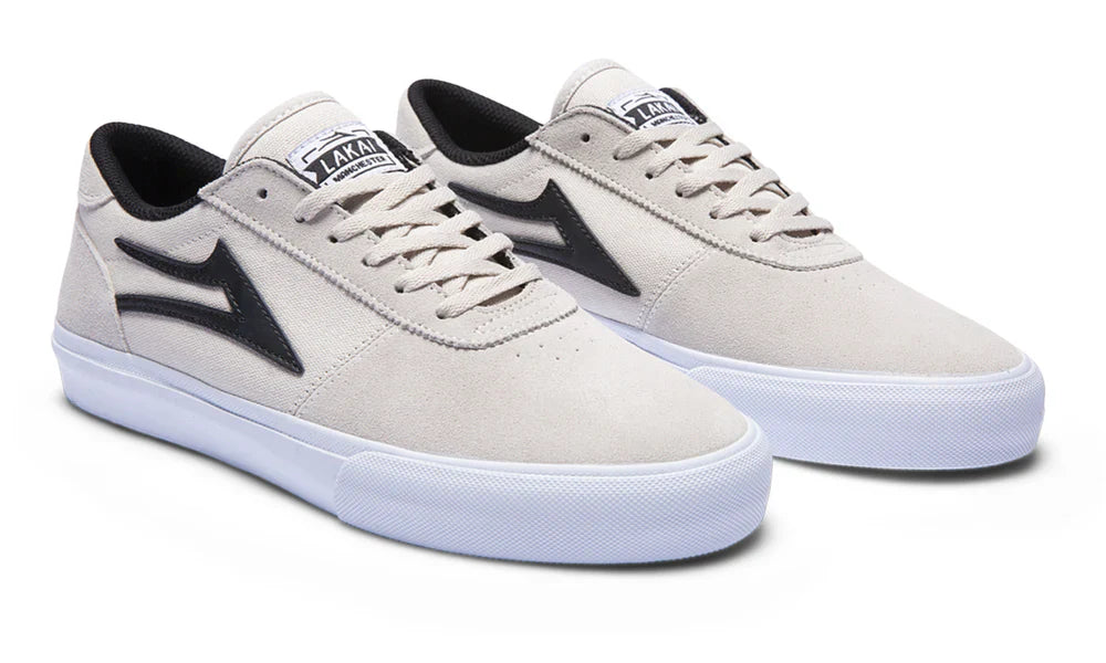 White and black suede Manchester skate shoes by Lakai.