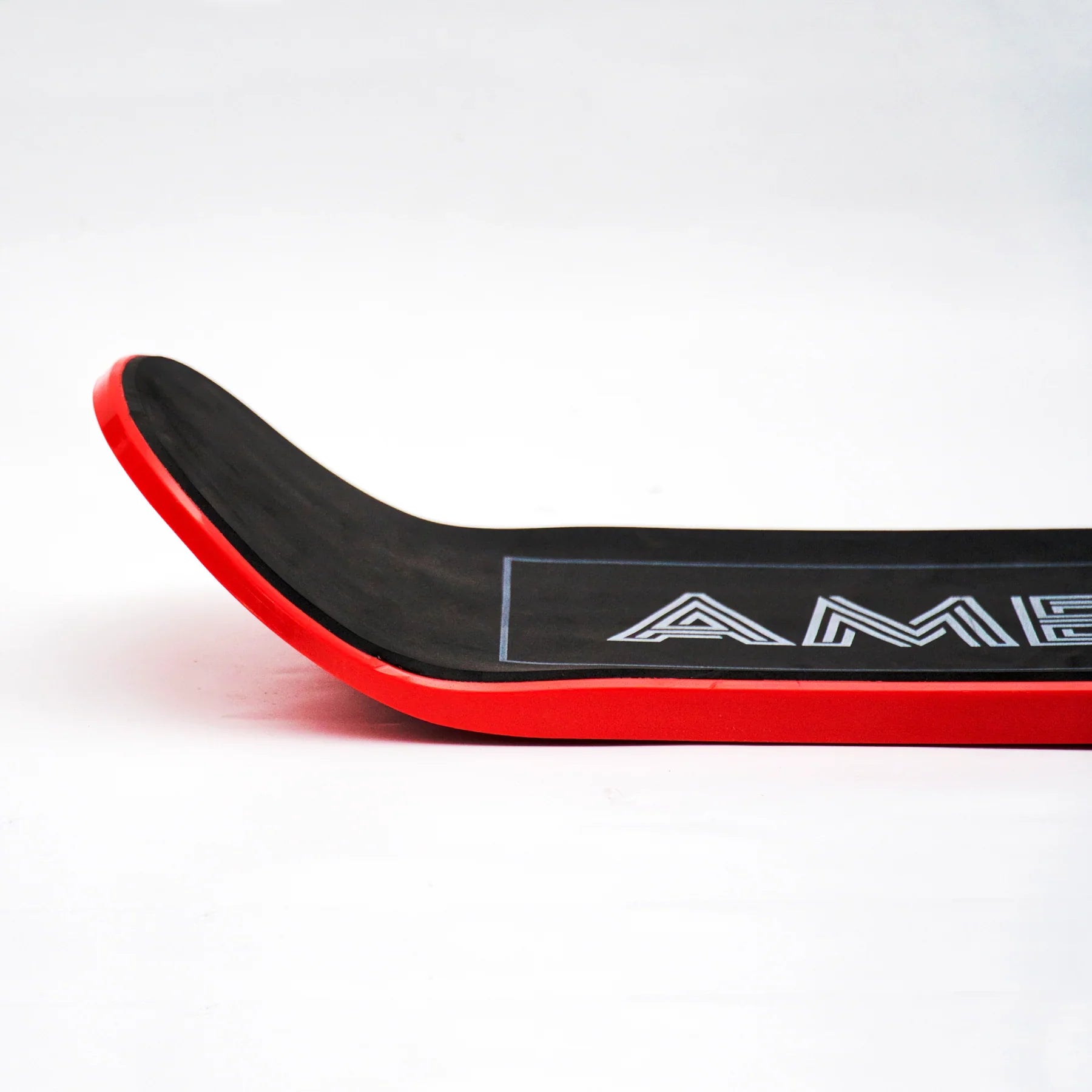 Jib Red 32.5 x 8.5 snowskate with HDPE core, EVA grip, and precision channels.