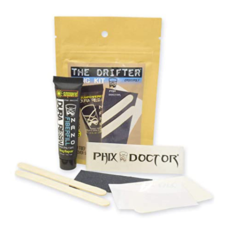 PHIXDOCTOR The Drifter Mini Travel Kit with sun-powered resin, ding tape, sand pad, cover sheets, sticker, and applicator sticks.