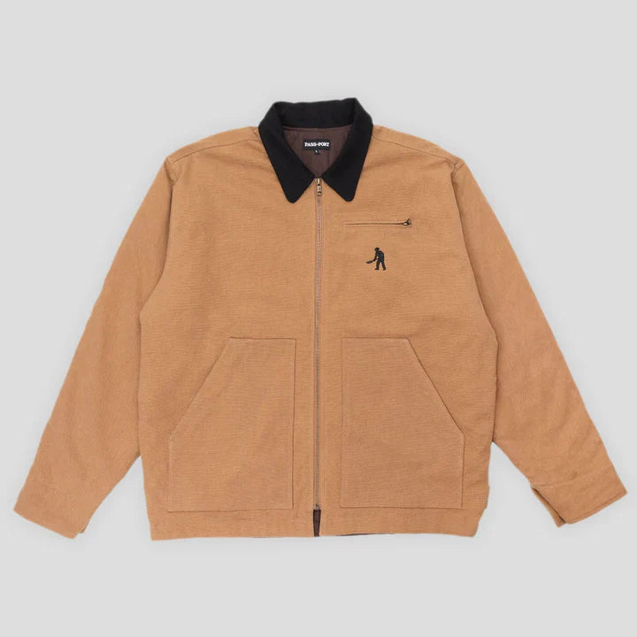 PASS-PORT packers jacket in caramel color with embroidery, heavy cotton canvas, and large front pockets.