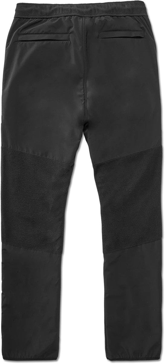 REST STOP PANT with 220 GSM micro polar fleece, 4-way stretch nylon butt panel, elastic waist, zippered fly, and easy access pockets.