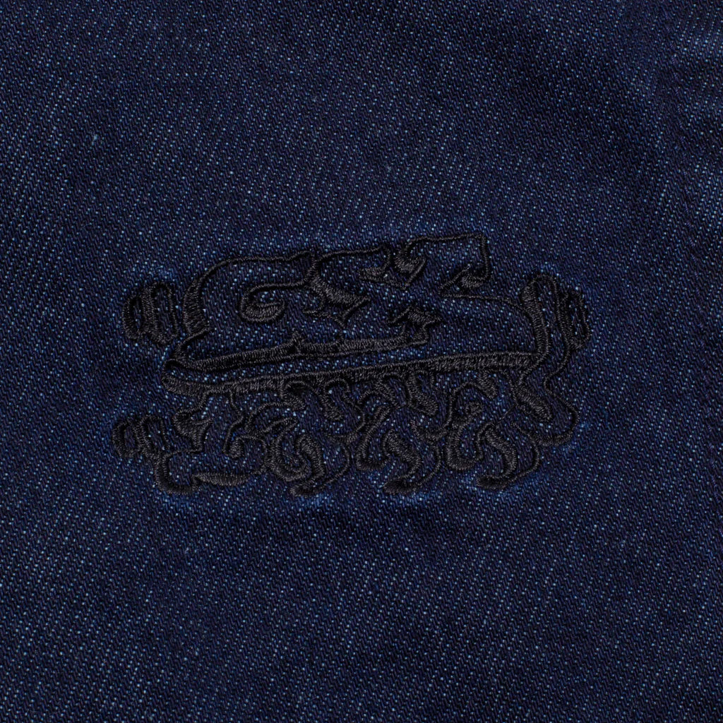 Close-up of GX1000 baggy pant with direct embroidery detail.