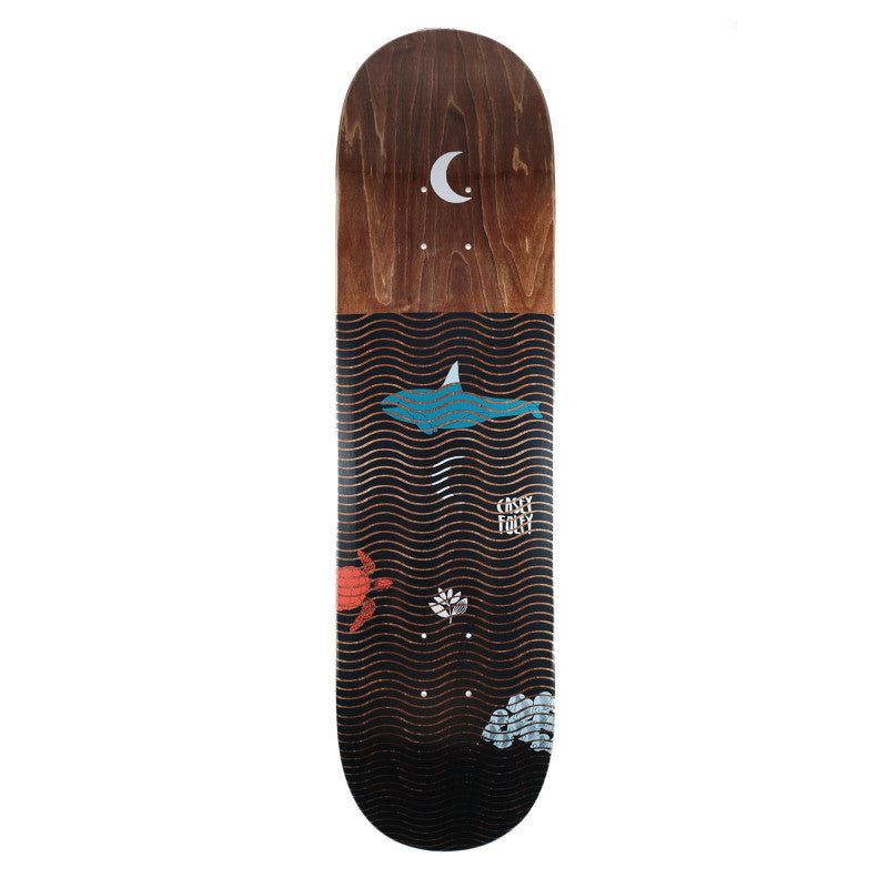 Magenta Casey Foley Deep Series 8.5 skateboard deck with moon and ocean wave design.