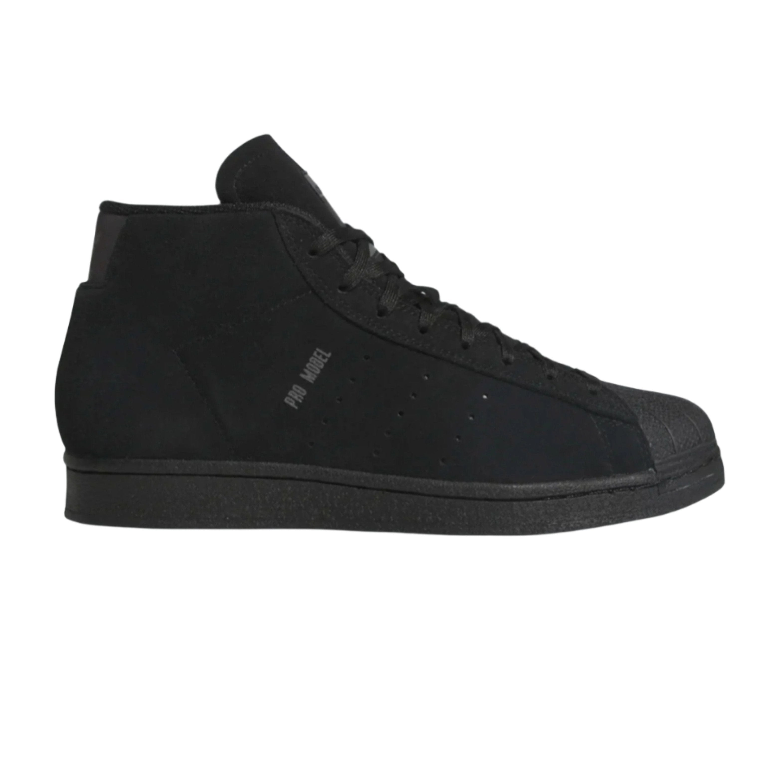 Adidas Pro Model black suede basketball shoes with rubber shell toe and soft outsole.