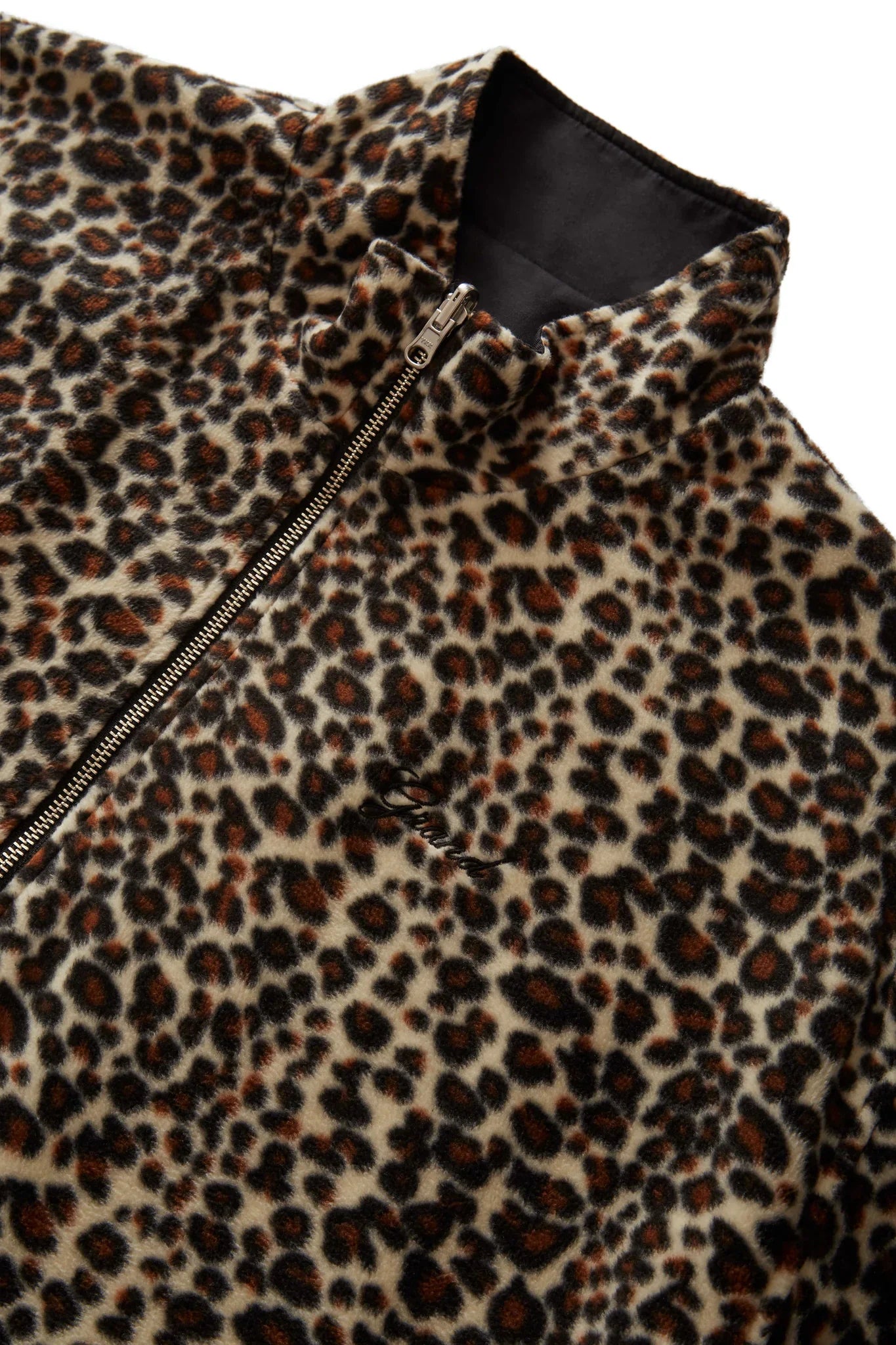 Grand Collection reversible leopard jacket, micro fleece leopard print with embroidered logo.