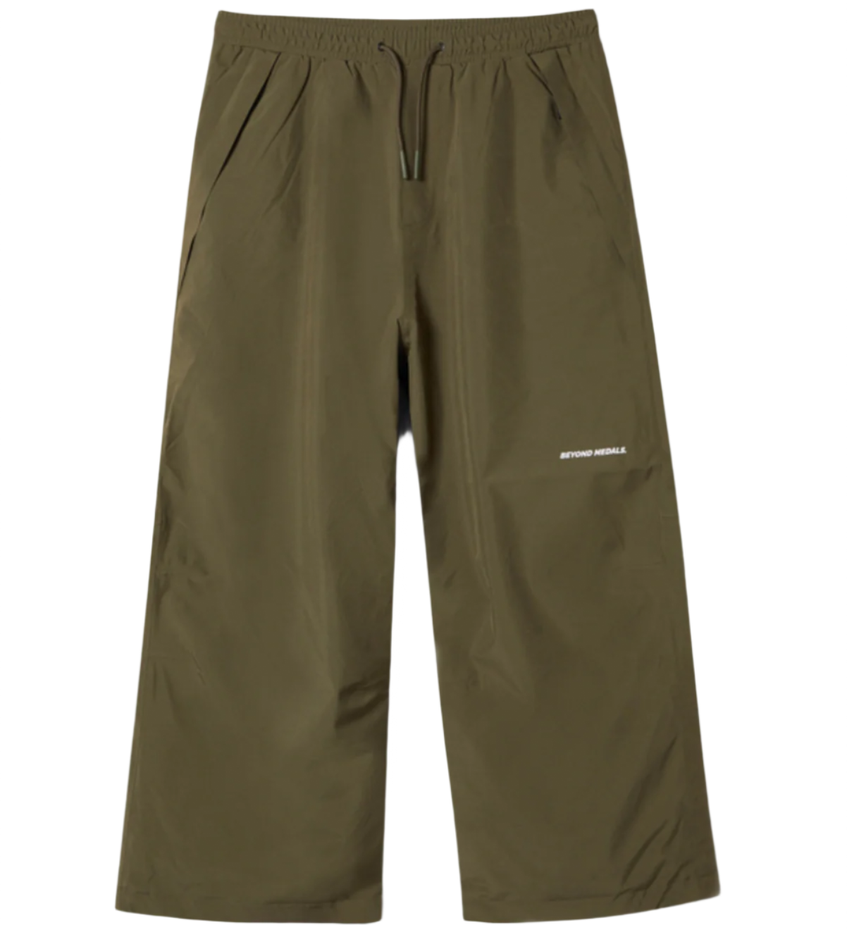 Beyond Medals park pant green, baggy, waterproof, PFC-Free, zippered pockets, elastic waistband.