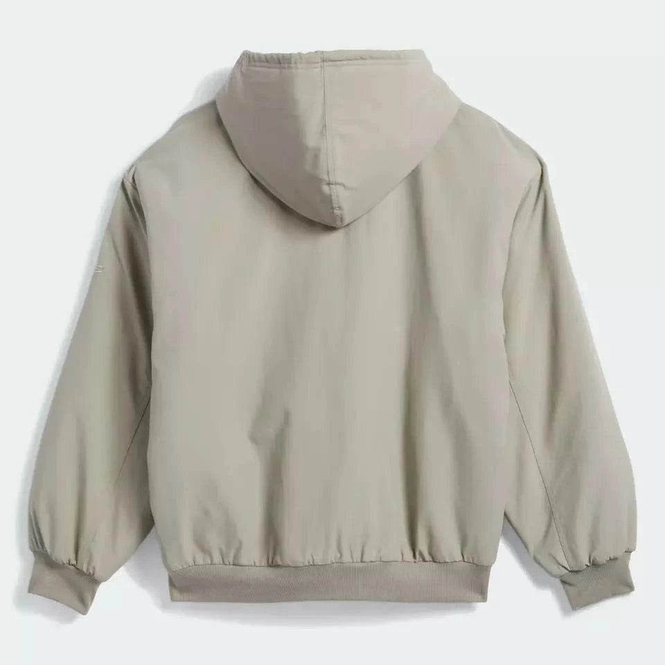 ADIDAS SHMOO CANVAS JKT in beige, featuring a drawcord hood and ribbed cuffs, made from 100% recycled materials.